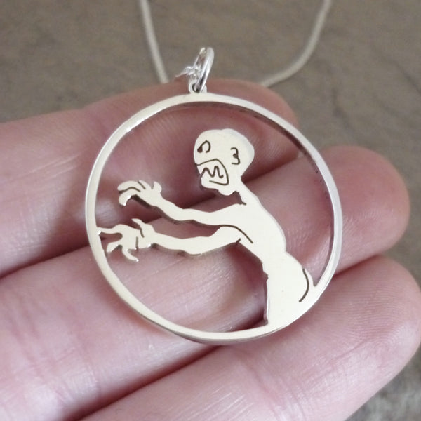 Grrr Aaargh says the Zompire - sterling silver pendant